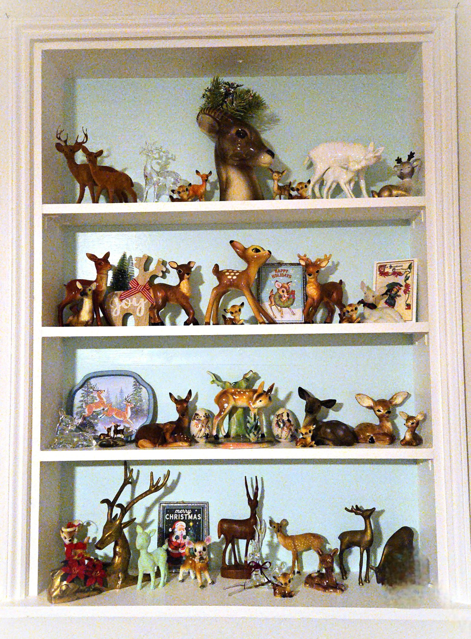Christmas deer collection on shelves